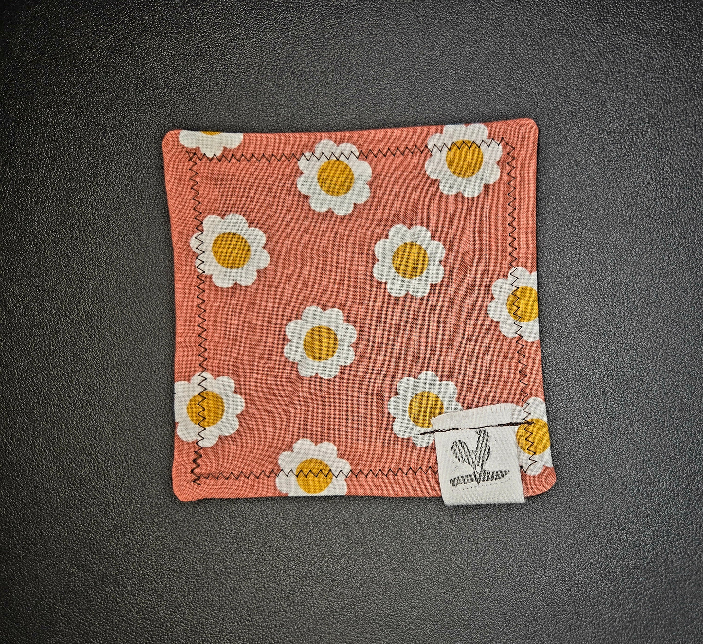 Rooster Ridge Rags Salmon with White and Yellow Flowers and Brown Stitching